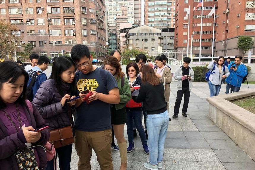 People at an event organised by Taiwanese NGO Fake News Cleaner on how to spot and report fake news, in New Taipei City last month. PHOTO: REUTERS